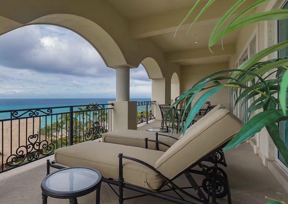Condo 509 private veranda with chaise lounges