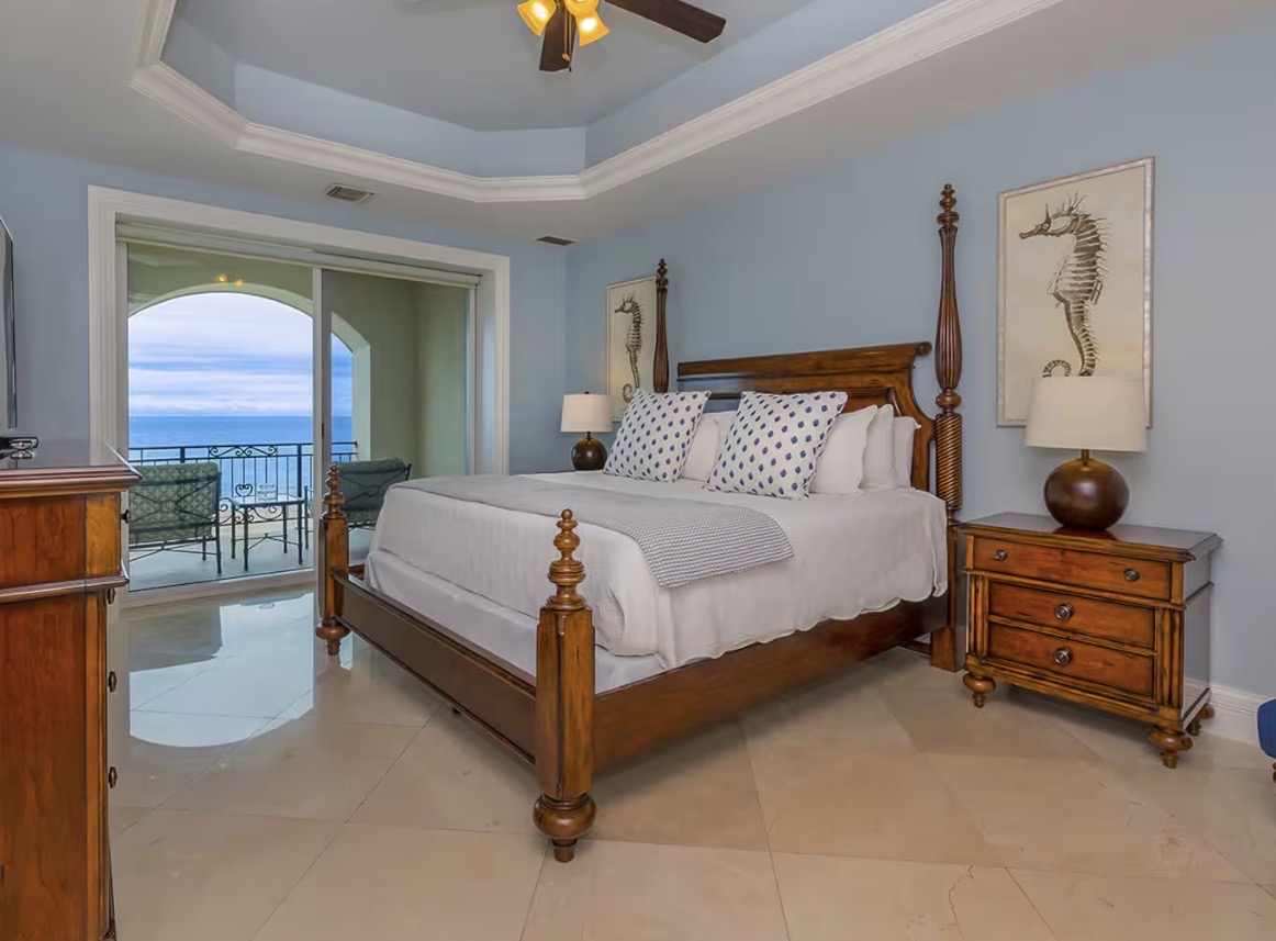 Condo 509 master bedroom with ocean view balcony